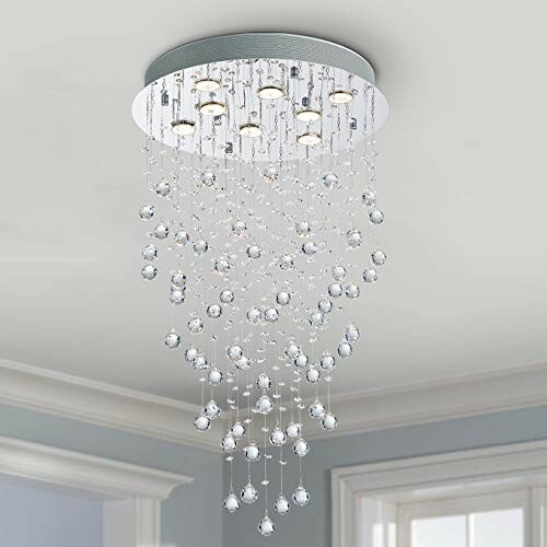 Elegant modern crystal chandelier with hanging spheres