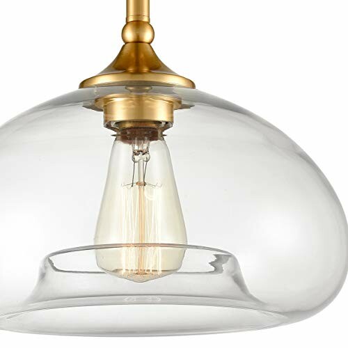 Clear glass pendant light with exposed bulb and brass fixture.