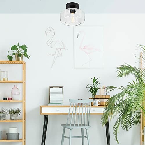 Stylish home office with desk, chair, plants, and ceiling light.